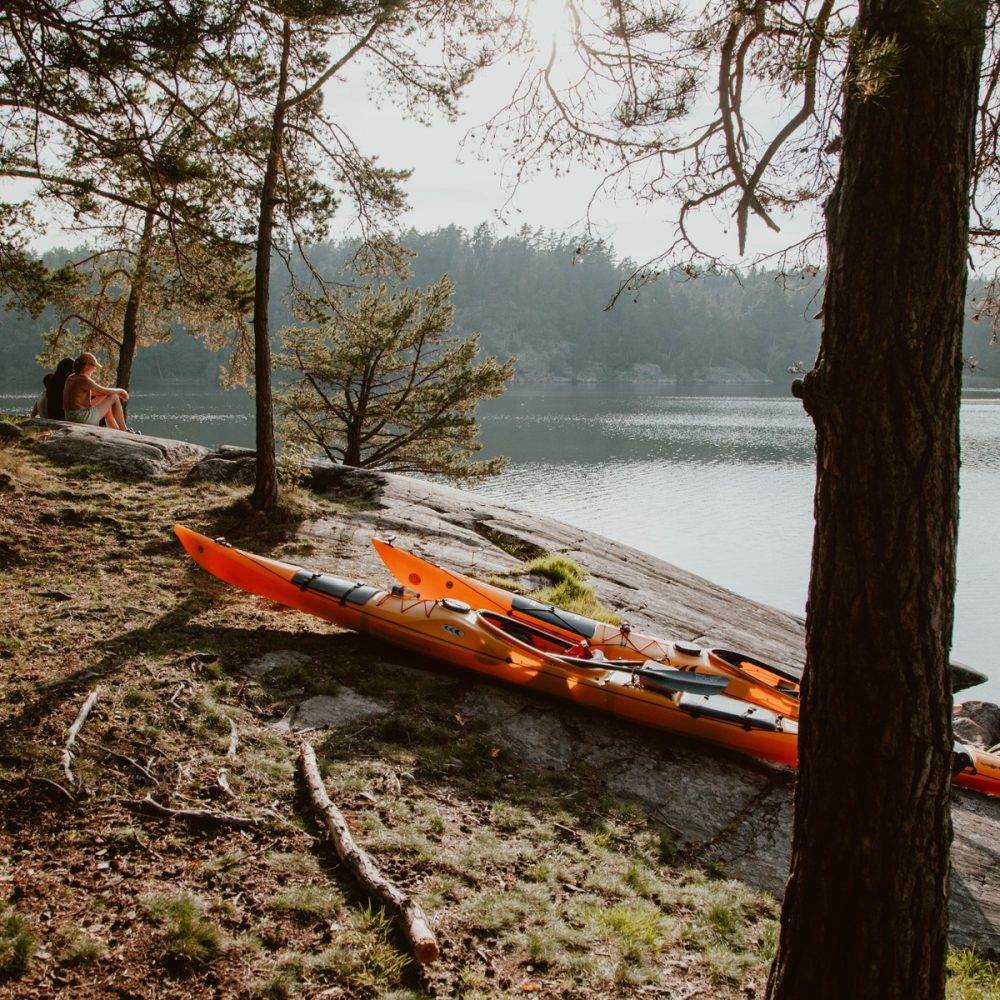 Kayaks Parked on the Island, Tent in the Background: Sunset Relaxation Time