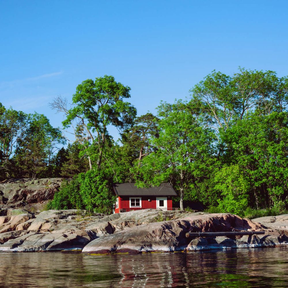 Iconic Landmarks: Explore Grinda's Distinctive Red Cottages