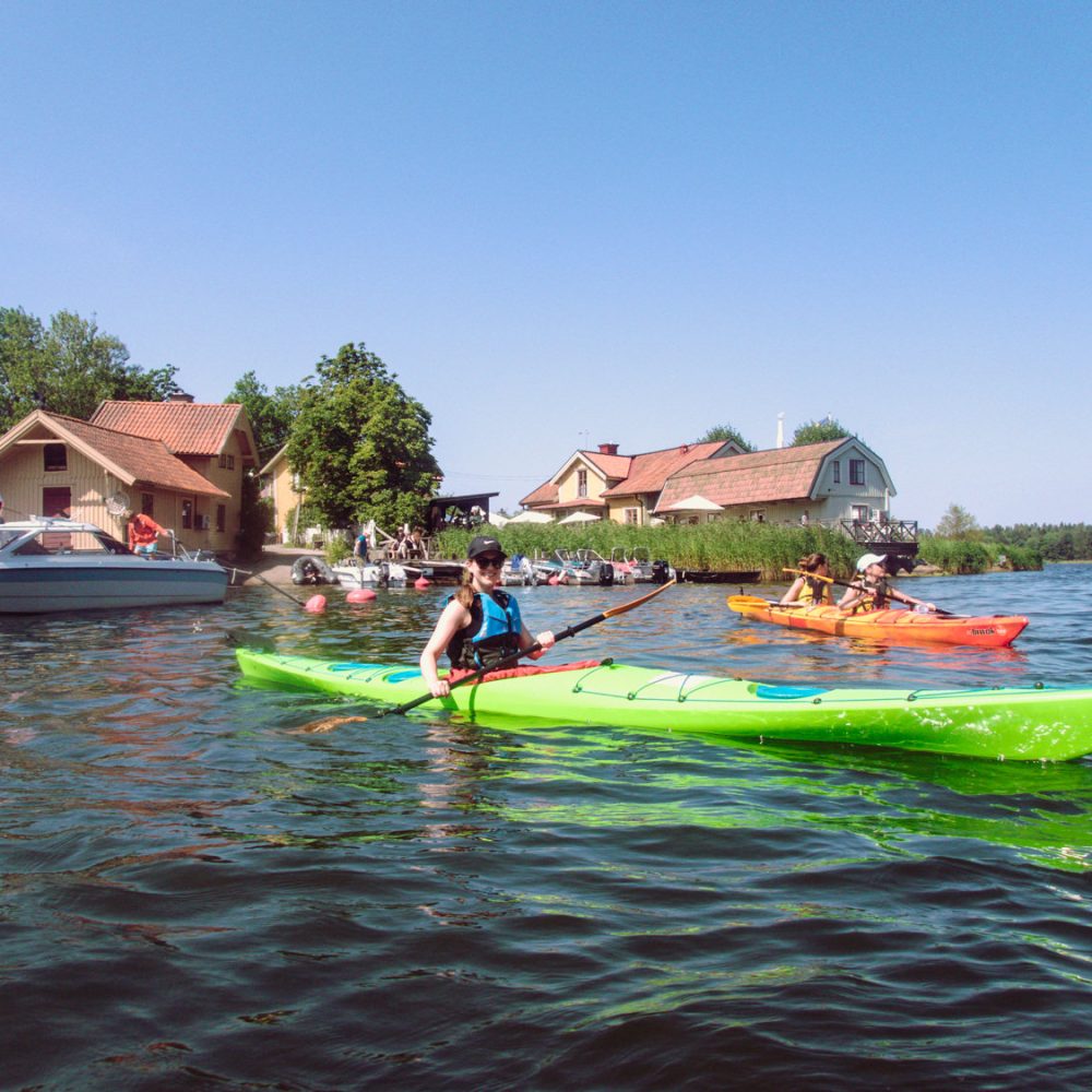 Norrhamn by kayak: Explore Vaxholm's charming harbor with serene paddling and picturesque views