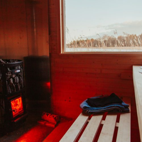 Wood-fired sauna with a traditional stove in Vaxholm, Stockholm Archipelago